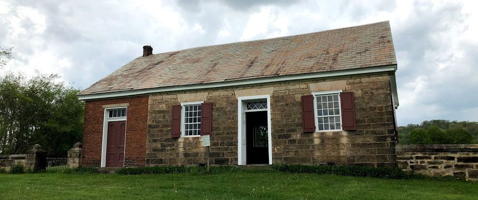 The Mennonite Meetinghouse with its red shutters